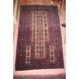 A Balochi rug (87 x 139 cm approx) est: £40-£60