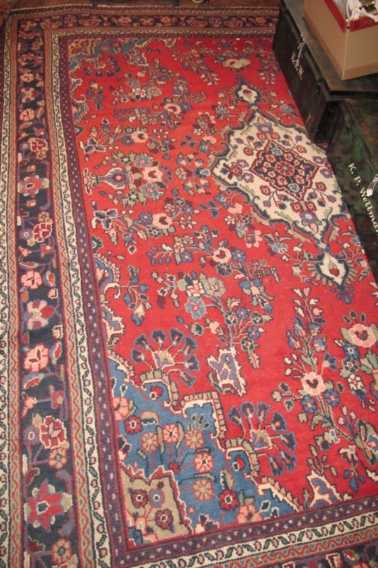 A 20c Hamadan carpet (338 x 268 cm approx) est: £200-£400