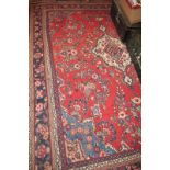 A 20c Hamadan carpet (338 x 268 cm approx) est: £200-£400