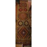 A Suzni Kilim runner (56 x 217 cm approx) est: £40-£60