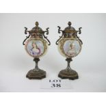 A pair of 19th century Continental decorative painted porcelain vases with cloisonné and gilt metal