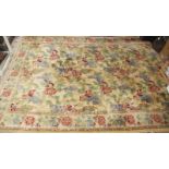 A 20c wool carpet on cream ground with floral design (183 x 275 cm approx) est: £80-£120