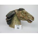 An unusual large carved wooden and painted horse's head 30 cm high (paint chipped and ears missing)