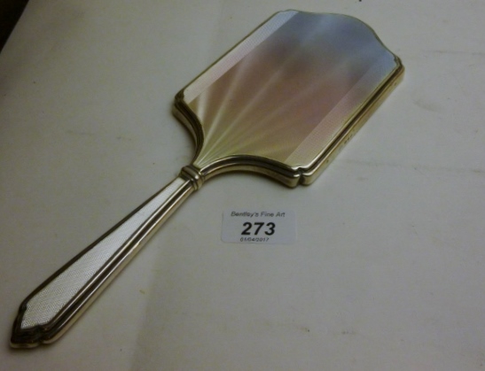 A silver and enamelled hand mirror London 1947 est: £100-£140