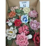 A collection of eleven Continental porcelain flowers est: £10-£15 (A3)