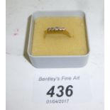 An 18ct five stone diamond set ring (size P) est: £80-£120