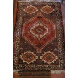 A Shiraz Dozar rug (154 x 101 cm approx) est: £70-£90