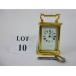 A French gilt brass four glass carriage clock the dial signed 'Wm Bruford & Son Eastbourne &