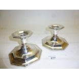 A pair of octagonal shaped candlesticks marked 830S est: £50-£90