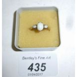 An 18ct gold opal and diamond ring (size M) est: £100-£150