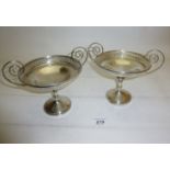 A pair of silver pedestal dishes with pierced edges Sheffield 1913 Walker & Hall est: £100-£150
