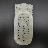 A Chinese white jade open work Buddha pendant est: £2,400-£3,