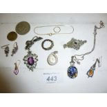 An assortment of costume jewellery to include a pair of amethyst earrings est: £20-£30
