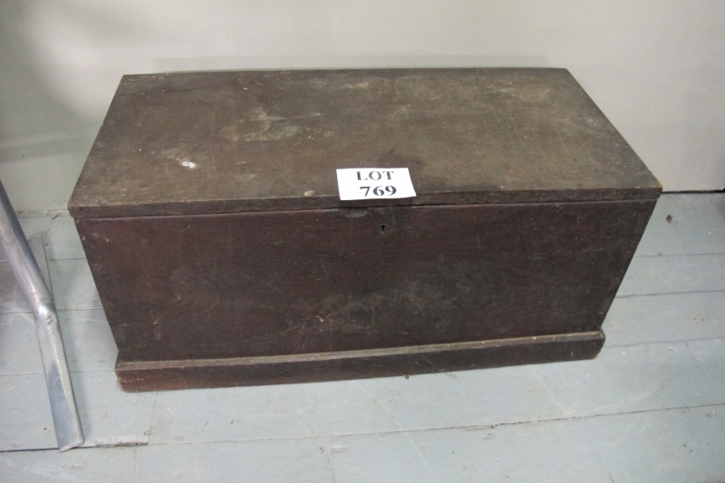 A 19c oak lidded trunk with brass side handles est: £50-£100