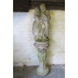 A garden statue on a column base (two section) est: £50-£80