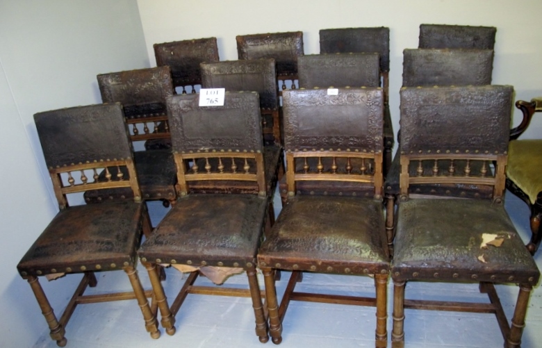 A set of twelve c1900 dining chairs upholstered in embossed brown leather (some a/f) est: £100-£200