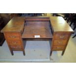 A c1900 oak desk with folding centre section with writing area est: £50-£100