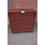 A Victorian mahogany chest of two short over three long drawers with turned handles and feet est: