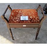 An Edwardian mahogany piano stool with lift up seat est: £25-£40
