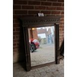 A Victorian light oak over mantle French mirror with bevelled glass est: £50-£80