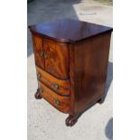 A Regency mahogany bedside cabinet with cupboard doors over two drawers,