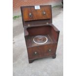 A Georgian mahogany commode cabinet with lift up top and china bowl inside est: £40-£60