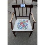 A C1900 country elm elbow chair with needlework seat est: £30-£50