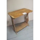 A 20c oak carved coffee table of small proportions est: £20-£30