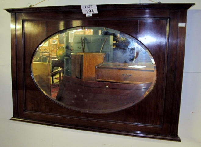 A c1900 mahogany framed wall mirror with oval centre glass est: £80-£120