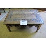 An early 20c oak carved low table est: £25-£40