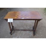 A Victorian walnut chess table with bobbin turned legs and stretcher est: £30-£40