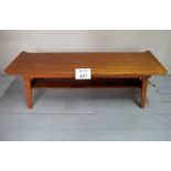 A 1960's coffee table with magazine shelf beneath est: £30-£50