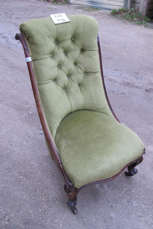 A Victorian mahogany framed nursing chair upholstered in green material est: £60-£90