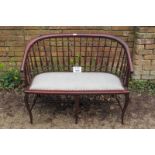 A 20c mahogany two seater spindle back settee est: £40-£70