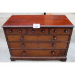 A c1900 mahogany chest of three short drawers over three long with turned handles est: £100-£120