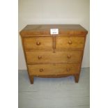 A 19c mahogany chest of two short over two long drawers with turned handles two lock escutcheons