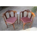 A fine quality pair of Victorian corner chairs upholstered in a dusty pink material (slightly a/f)