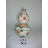 A Chinese double gourd vase painted with