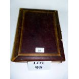 A Victorian photograph album with leathe