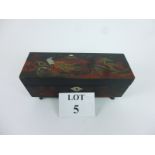 A Japanese lacquer musical jewellery box