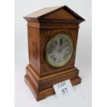 A c1900 walnut cased mantel clock with chiming movement and fine inlaid detailing (with pendulum)