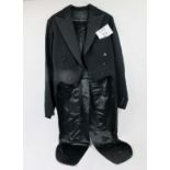 An early 20c black gentleman's tail coat est: £30-£40 (C)