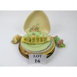 A collection of plates and toast racks to include Carlton Ware,