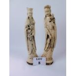 A pair of oriental painted statues est: £20-£30