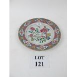 An 18c Chinese plate with central flower