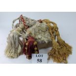 A box of various curtain ties and tassel