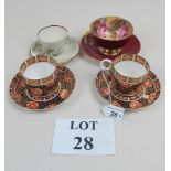 A collection of four cups and saucers to include two Crown Derby est: £30-£50 (N3)