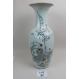 A large Chinese baluster vase painted with figures in a garden in coloured enamels,