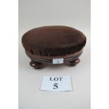 A Victorian round footstool upholstered in brown velvet est: £20-£30 (A1)