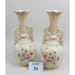 An attractive pair of late 19c early 20c long necked vases decorated with flowers est: £50-£80 (A1)